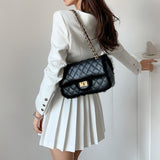 Square-neck jacket and short pleated skirt co-ord set