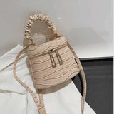 Crocodile-effect bucket bag with shoulder strap