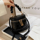 Crocodile-effect bucket bag with shoulder strap